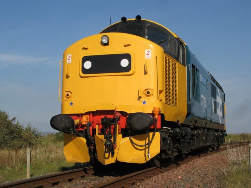 37175 at Kinneil: 37175 gleams in the sunshine just outside Kinneil Station on 28/9/11 during a line proving run. Photo of 37175 at Kinneil