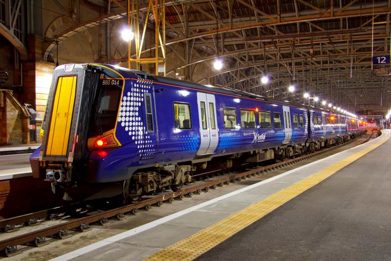 380014 under the night lights at Glasgow Central: 380014 waits in Glasgow Central station for its next turn on 02/09/2011 Photo of 380014 under the night lights at Glasgow Central