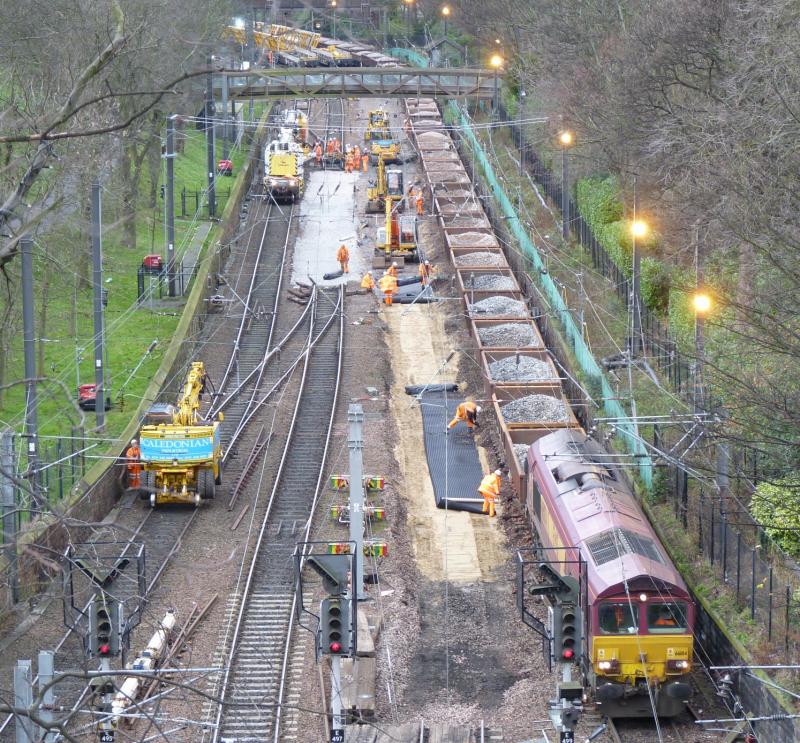 Track replacement Princes Street Gardens Xmas day 2011: A busy scene in Princes Street Gardens on Xmas day 2011 as the pointwork which previously had derailed a DMU is replaced. Photo of Track replacement Princes Street Gardens Xmas day 2011