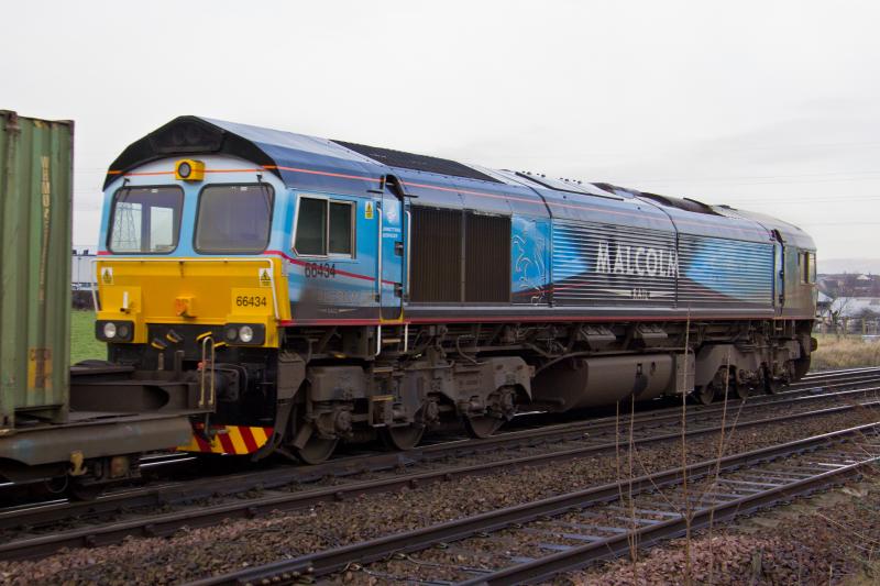 66434 Larbert Jnct on 4A13: 66434 in new Malcolm's livery, but now minus the Malcolms sticker on the front of the loco powers away from Larbert Jnct 28/01/2012 Photo of 66434 Larbert Jnct on 4A13