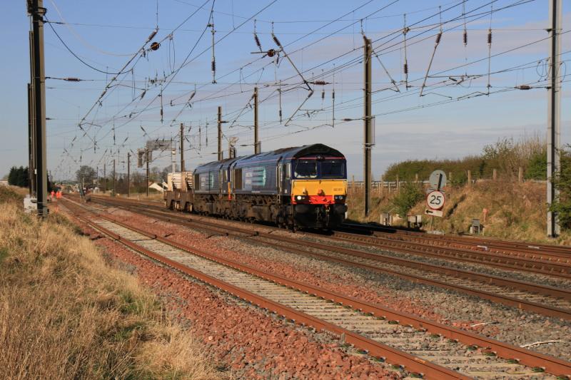 6S43 passing through a sunny Drem: 66305 + 66301 on 6S43 06.42 Carlisle to Torness passing through Drem loops in perfect sunshine on 05/04/2012 Photo of 6S43 passing through a sunny Drem
