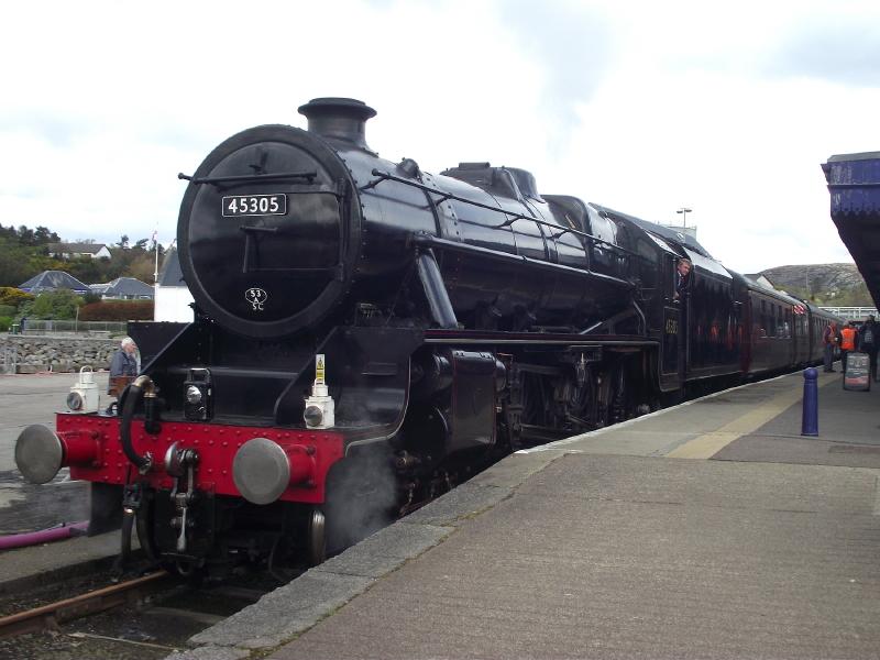 45305 on the blocks at Kyle.: As close to Skye as a train can get ?
45305 in Kyle after arrival with 1Z34, the 06:32 Inverness - Kyle leg of the 'Great Britain V' railtour. Photo of 45305 on the blocks at Kyle.