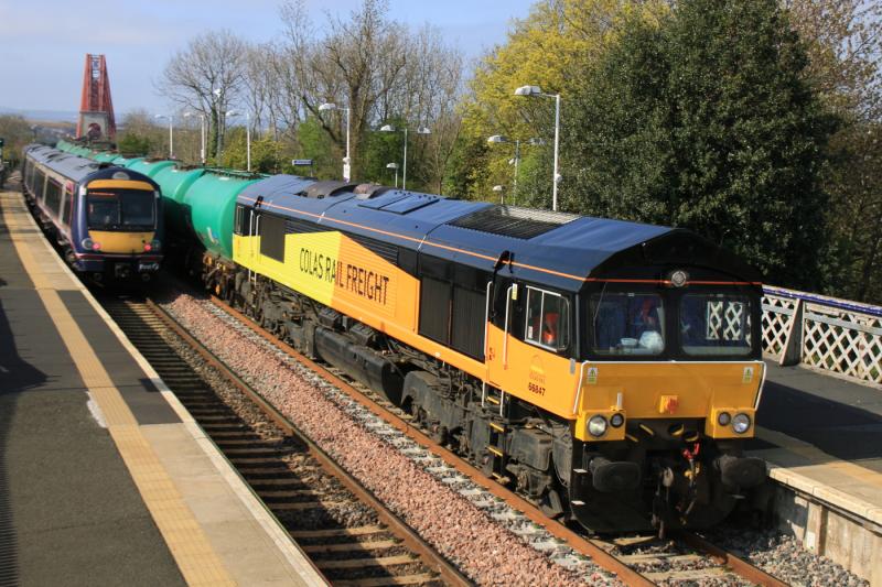 Very Near Miss at Dalmeny: 66847 on 6Z47 Linkswood to Grangemouth emerges from behind 170396 at Dalmeny Stn on 02/05/2012 Photo of Very Near Miss at Dalmeny