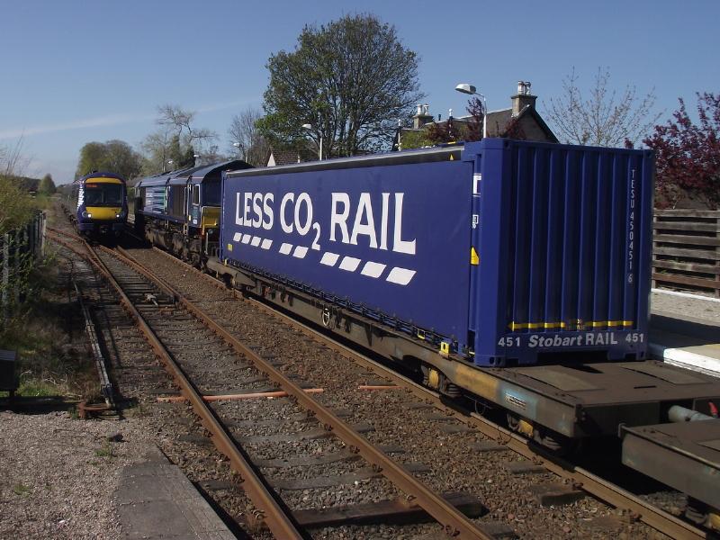 66 305 at Nairn - 01st May 2012: 66305(4H47) waits at Nairn to cross 170428, working 1A50, the 10:58 Inverness - Aberdeen. Photo of 66 305 at Nairn - 01st May 2012