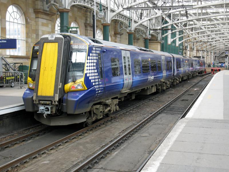 Class 380: A Class 380 as seen at Glasgow Central on Saturday 19 May in the latest Scot Rail saltire livery Photo of Class 380
