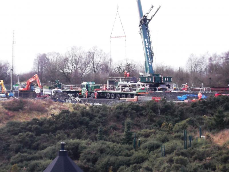 New bridge West of Tamfourhill one: today saw the new bridge being put in place on the B816 Tamfourhill to Bonnybridge road over the Falkirk High line. Photo of New bridge West of Tamfourhill one