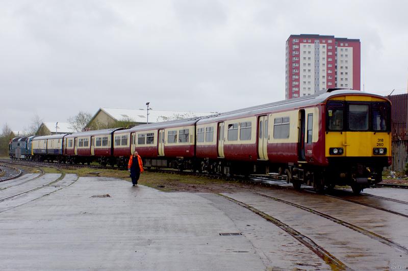 318: 318260 being shunted into No 4 road after arrival at Railcare Springburn by 55022 on the 3rd May
Photo with permission of both Railcare and Martin Walker Photo of 318