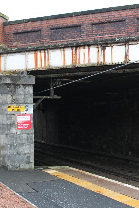 Low-lying OHLE : Low-lying overhead wires at Hillfoot station. Can't be much higher than eight foot off the platform at the lowest part. Photo of Low-lying OHLE