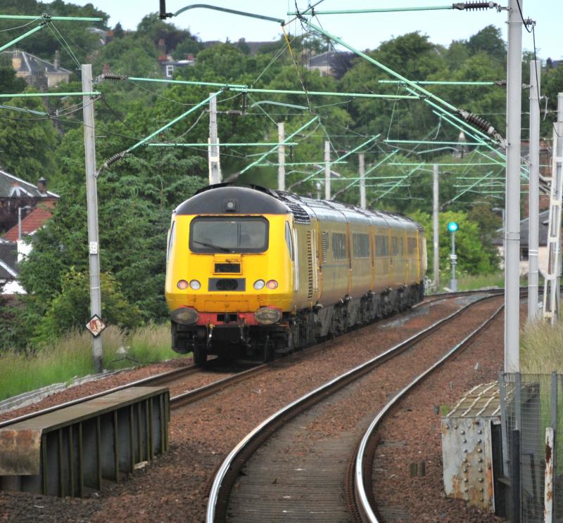 NMT On Cathcart Circle: With 43013 on the rear and 43014 on the front the NMT is seen heading down the incline from Shawlands to Maxwell Park.Tis is a Newton to Glasgow Central Working 25/06/13 Photo of NMT On Cathcart Circle