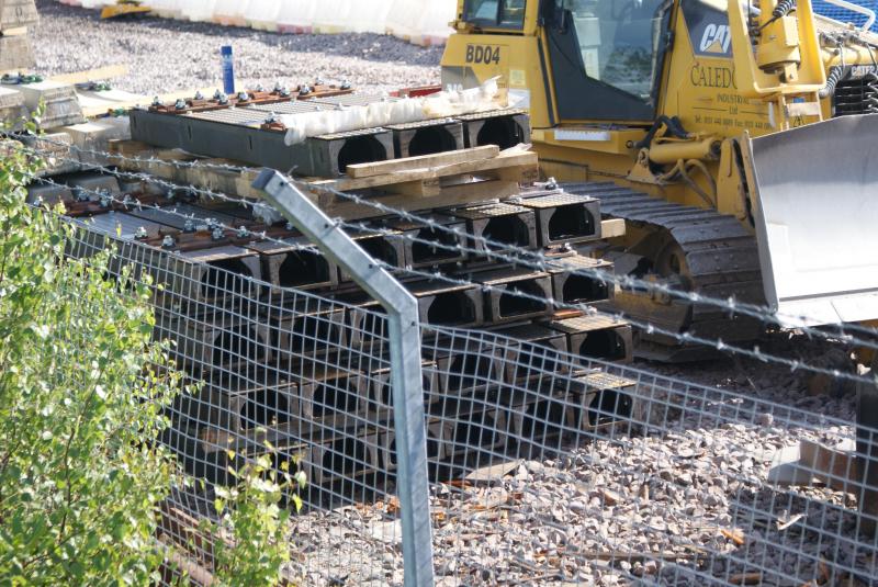 Stack of hollow sleepers at the former Stirling Engineer's Sidings. 21.07.13: Stack of Pandrol clip hollow sleepers at the former Stirling Engineer's Sidings. 21.07.13 Photo of Stack of hollow sleepers at the former Stirling Engineer's Sidings. 21.07.13