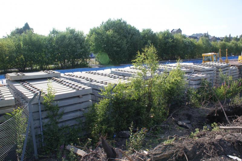 Stacks of concrete sleepers at the former Stirling Engineer's Sidings. 21.07.13: Stacks of concrete sleepers at the former Stirling Engineer's Sidings. 21.07.13 Photo of Stacks of concrete sleepers at the former Stirling Engineer's Sidings. 21.07.13