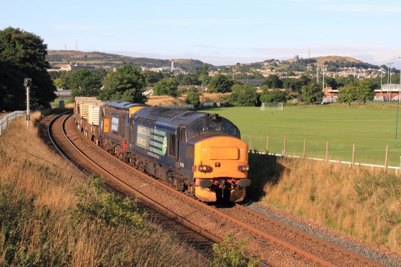 6S43: 37218 leading 20304 on 6S43 06.42 Carlisle Kingmoor to Torness Power Stn passing Peffermill Playing Fields on 30/08/2013 in full sun Photo of 6S43