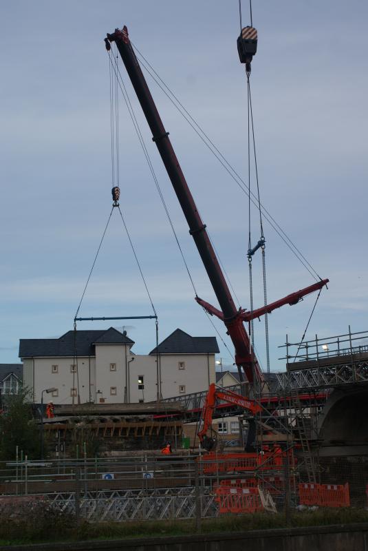 A deck section of Span 1 gets lifted out: A deck section of Span 1 of Shore Road gets lifted out now that the the tamper is far enough away. 14.09.13 Photo of A deck section of Span 1 gets lifted out