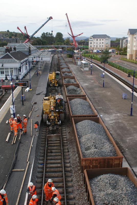 Stirling P.6's track back in place: Stirling P.6's track back in place. Top ballast being placed and tamping proceeding from the north end. 14.09.13 Photo of Stirling P.6's track back in place