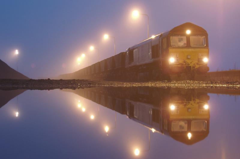 Reflected images: 66245 reflected in the puddles of a foggy Leith Docks while its train of HAAs is loaded with imported coal before forming 7B01 0900 for Cockenzie. Photo of Reflected images