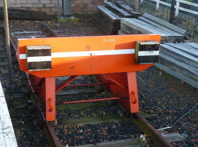 buffer stop: buffers with mileage painted on Photo of buffer stop