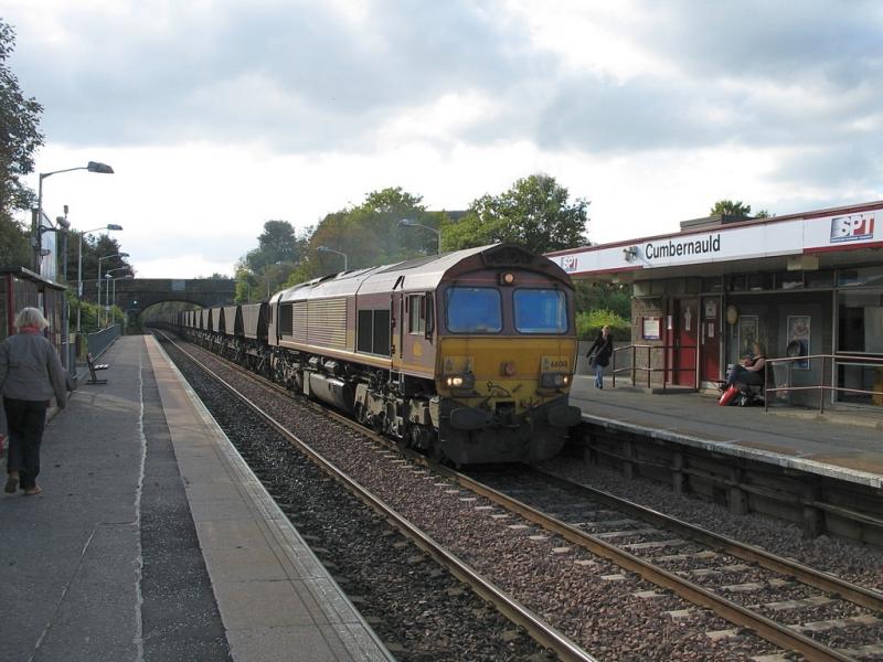 66018 at Cumbernauld: 66018 passes Cumbernauld with 7G18, the 13:00 Hunterston - Longannet MGR. Photo of 66018 at Cumbernauld
