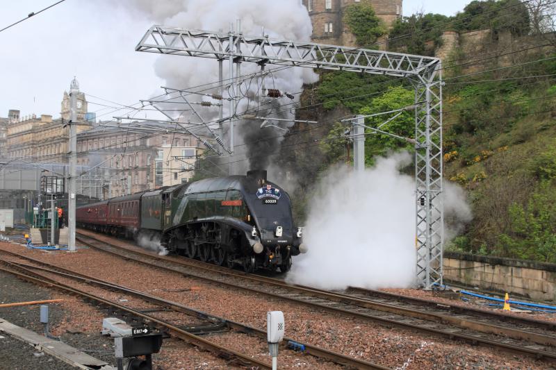 60009 on 1Z28 in less steam: 60009 on 1Z28 09.33 Edinburgh to London Kings Cross leaving Plat 1 Waverley with the left cylinder cock open on 04/05/2014 Photo of 60009 on 1Z28 in less steam