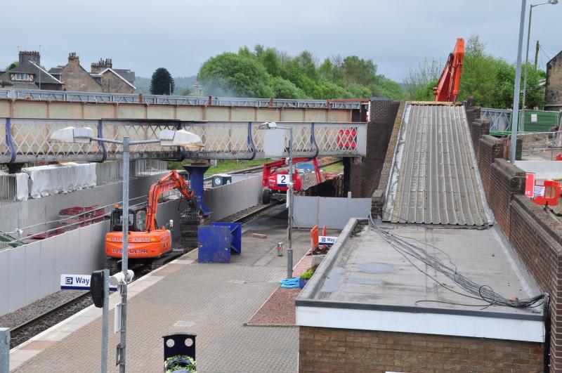 Larbert bridge removal: You can just make out the cutters torch sparks in this picture of the bridge removal Photo of Larbert bridge removal