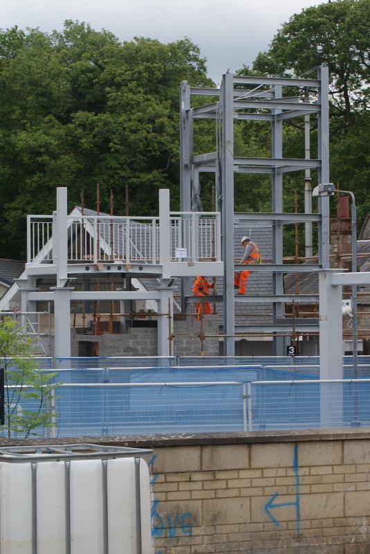 Dunblane new bridge progress 01.06.14 005: Dunblane Station's new bridge progress on 01.06.14. P.1's lift shaft steel frame and bridge landing stage installed. Photo of Dunblane new bridge progress 01.06.14 005