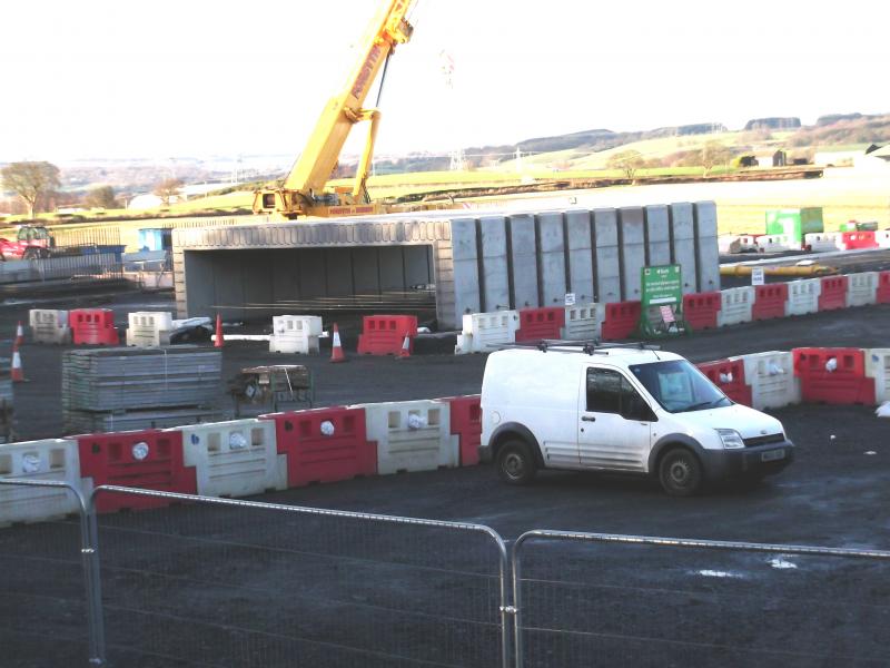 Concrete structures in Carmuirs compound: Taken today. These look like pre-fabricated concrete sections that will replace the tunnel. Photo of Concrete structures in Carmuirs compound