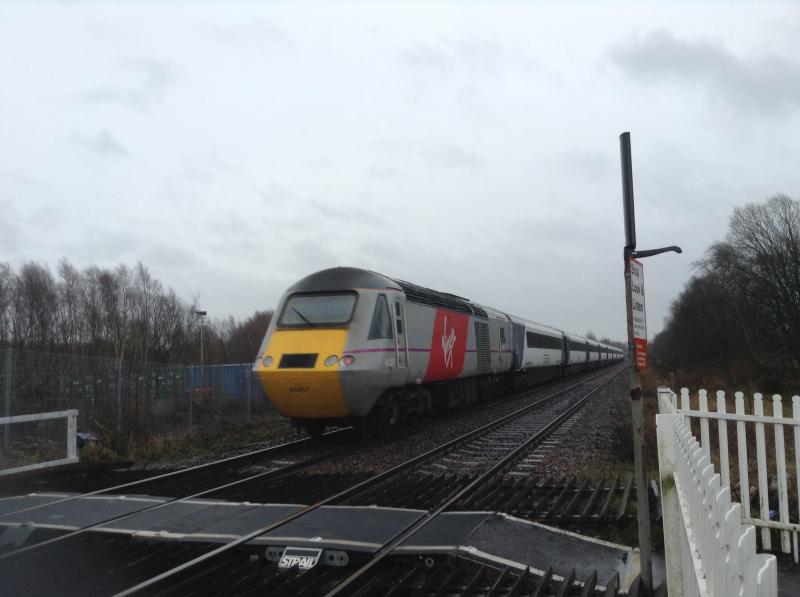 HST: Rebranded Virgin 43257 on the rear of KX bound 43319 on 07/03/15 Photo of HST
