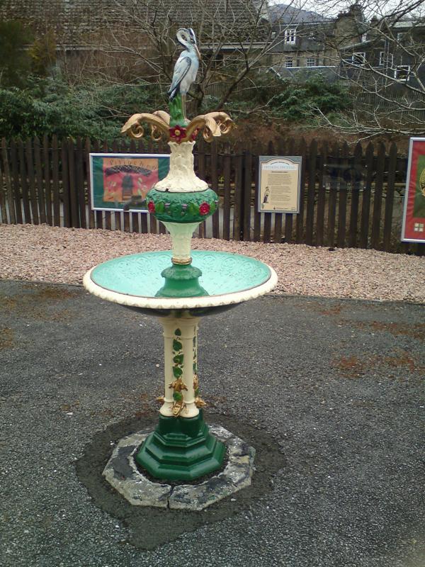 Heron drinking fountain at Pitlochry.: Victorian cast iron fountain on southbound platform. Photo of Heron drinking fountain at Pitlochry.