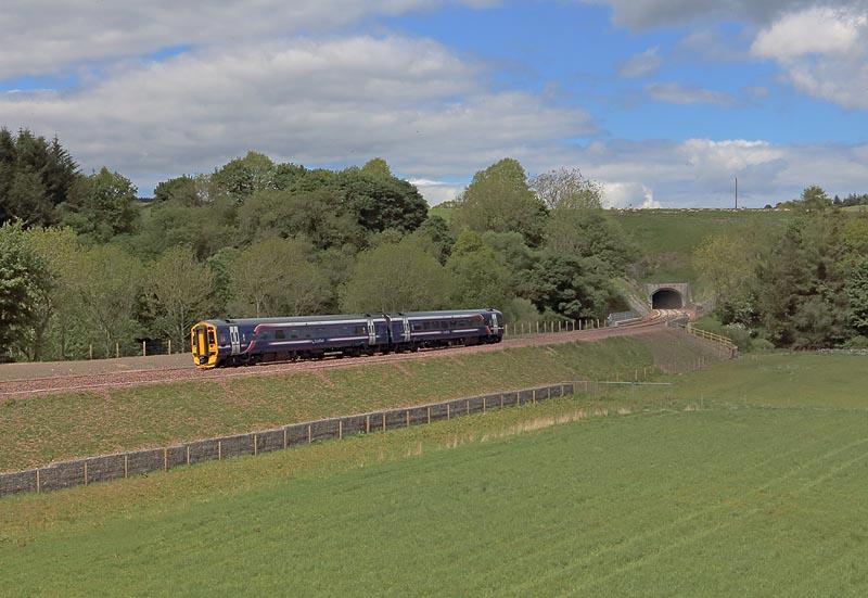 158741 at Bowshank: 158741 emerges from the south portal of Bowshank Tunnel north of Galashiels during a driver training run on the afternoon of 8th June 2015 Photo of 158741 at Bowshank