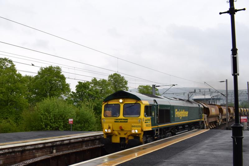 FL66 on Mossend Yard to Tulloch at Dumbarton Central: FL Class 66 #66525 with autoballasters from Mossend to Tulloch approaches Dumbarton Central on 17 May 2016 running some 5 mins late Photo of FL66 on Mossend Yard to Tulloch at Dumbarton Central
