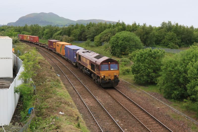 A Clear View at Niddrie of 4E99: 66020 on 4E99 Mossend to Tees Dock at Niddrie West Jct passing the recently cleared trees on 10/06/2016 Photo of A Clear View at Niddrie of 4E99