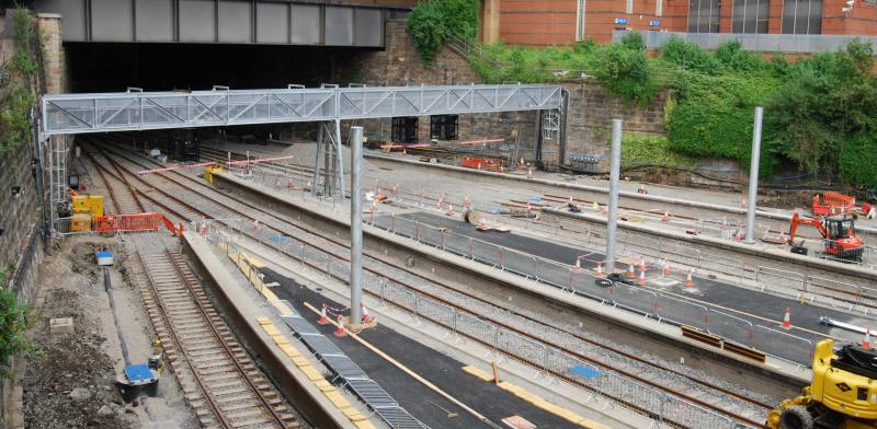 Signal Pods on Gantry & OHL Masts: 3 Signal Pods have been installed onto the new gantry and 3 OHL Equipment Masts now installed Photo of Signal Pods on Gantry & OHL Masts