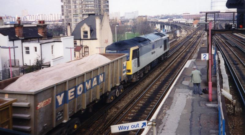 Paddington bound: 60039 GLASTONBURY TOR at Wandsworth Road in South London with a stone train from Angerstein Wharf to Paddington during the major track alterations of 1996. Photo of Paddington bound