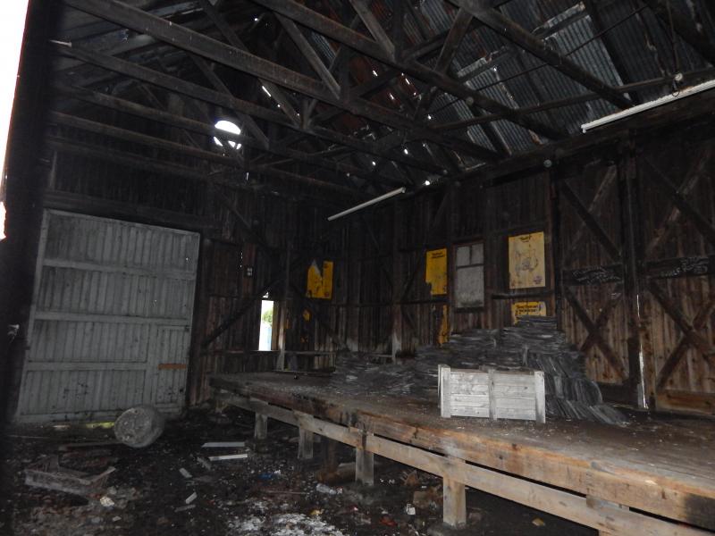 Brora Goods Shed: The original wooden Highland Railway goods shed still stands in fairly good condition. Photo of Brora Goods Shed