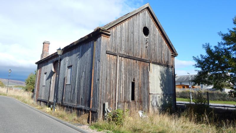 Brora Goods Shed: The original wooden Highland Railway goods shed still stands in fairly good condition. Photo of Brora Goods Shed