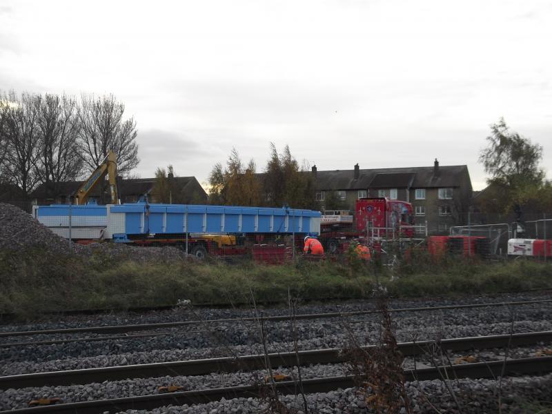 new railway bridge: The new railway bridge waiting to get unloaded in the compound. Photo of new railway bridge