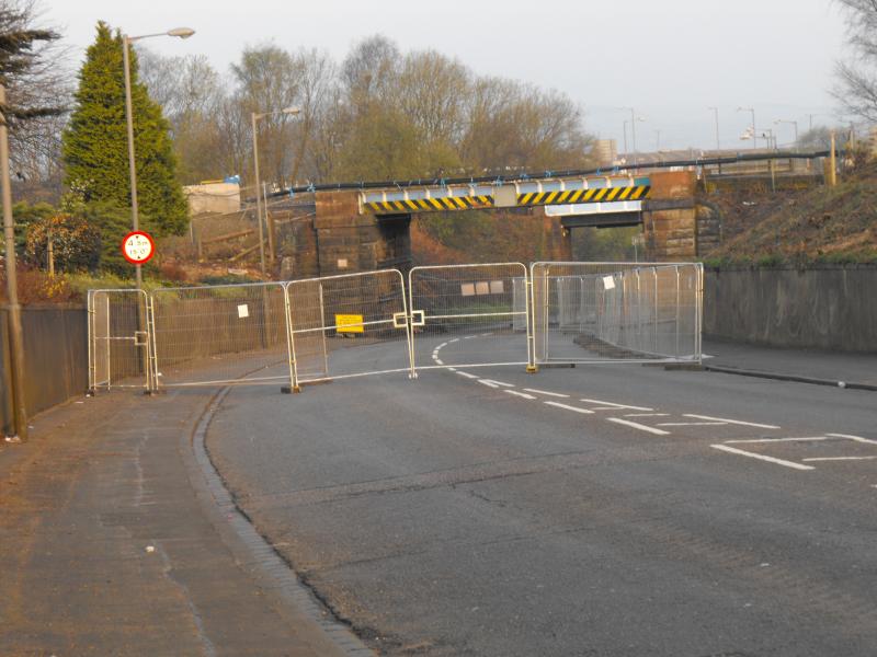 side fence removed from existing bridge: The road closure will allow the decking to be removed from the bridge. The side fencing has been removed as you can see in this photo. Photo of side fence removed from existing bridge