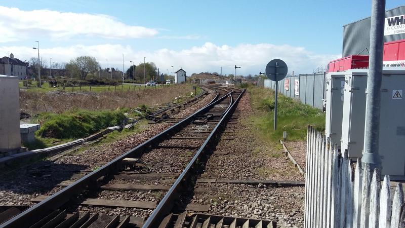 Top Line Improvements: Aberdeen to Inverness Improvements Forres 15-04-17
Start of existing Forres loop looking West from Whites Removals level x/ing. New alignment will follow the cut off siding straight ahead Photo of Top Line Improvements