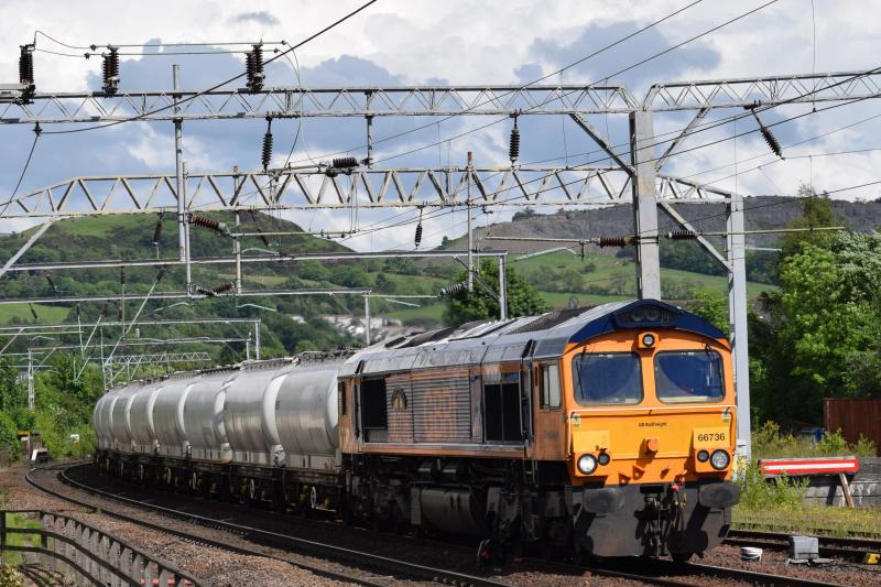 6S45 Dumbarton Central 2.6.17: GBRF 66736 Wolverhampton Wanderers approaches Dumbarton Central on 6S45 with 24 PCAs on 2 June 2017. Photo of 6S45 Dumbarton Central 2.6.17