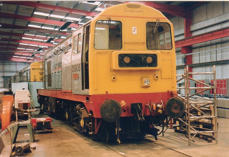 20905 @ Kilmarnock: 20905 leads a line of its fellow class 20/9 members undergoing their winter maintenance at Hunslet Barclay's Kilmarnock depot on 14 November 1993. Photo of 20905 @ Kilmarnock