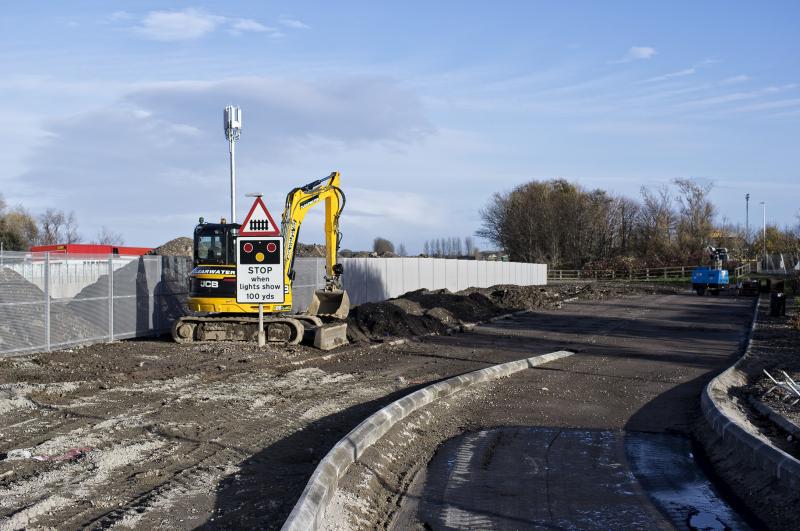 REDUNDANT L.C. SIGN AT FORRES.jpg: THE L.C. HAS BEEN REPLACED BY A NEW BRIDGE AND IT LOOKS AS THOUGH THE FORMER ROAD, NOW A DEAD END, IS GETTING A MAKEOVER. Photo of REDUNDANT L.C. SIGN AT FORRES.jpg