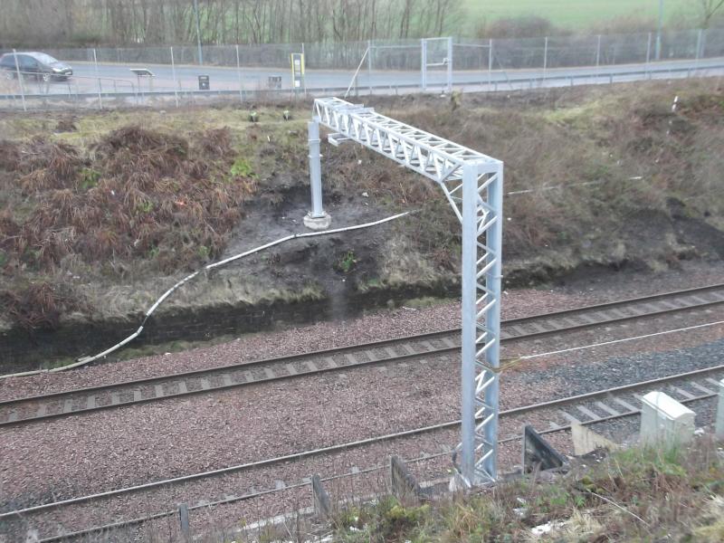 mini overhead line support: Located right next to the Carmuirs aqueduct is this mini overhead line support. Not sure what they will do with it as the side nearest the camera has a double track support. Photo of mini overhead line support