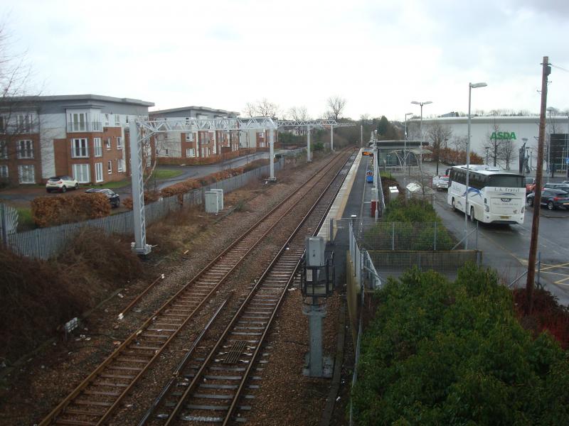 Alloa Station: Photo taken on Tuesday 27th March 2018. OHL installation progressing while line is closed. Seems to be plenty of space for a second platform on the left? Photo of Alloa Station