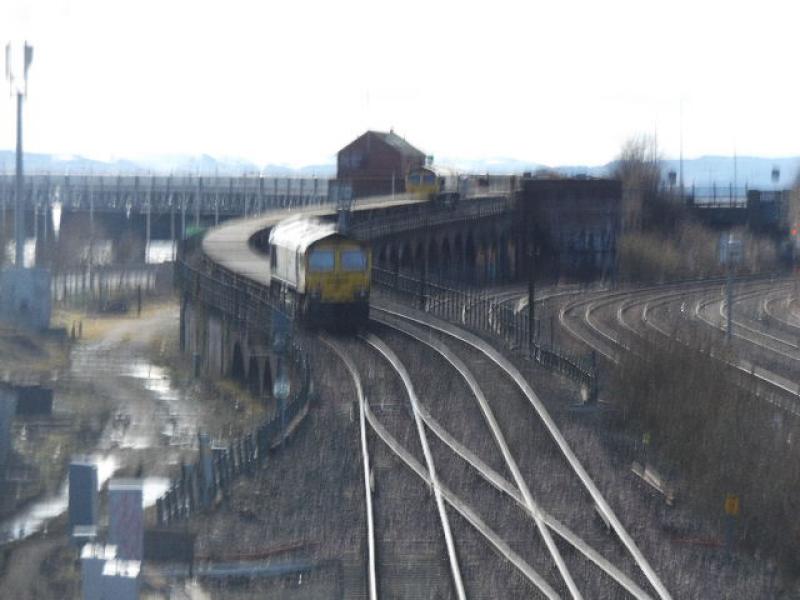 66597 and 66502.: 66597 and 66502 on the brick arches of the Tay Bridge, Dundee. 6K50 working. Photo of 66597 and 66502.