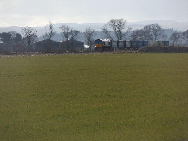 66304: 66304 on the 4A13 Grangemouth to Aberdeen Intermodal. The photo was taken by one of the level crossings by Longforgan. Photo of 66304