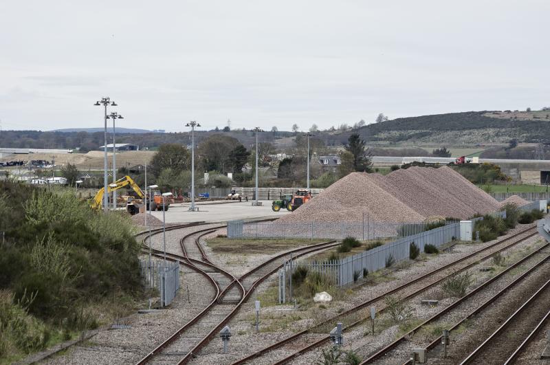RAITHS FARM (1).jpg: STOCKPILING SLEEPERS AND BALLAST AT RAITHS FARM JUST NORTH OF DYCE IN READINESS FOR THE REDOUBLING WORK. 1.5.18 Photo of RAITHS FARM (1).jpg