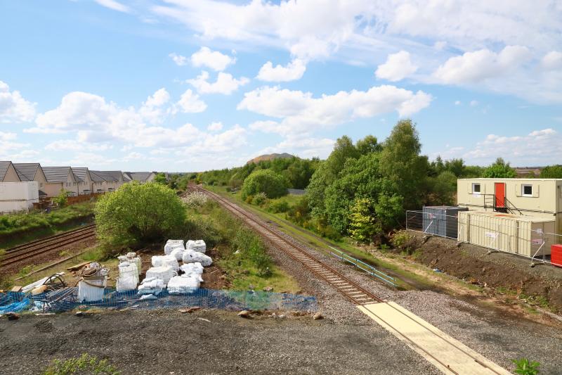 View along the Sub at Niddrie: Photo spot opened up by tree felling at Niddrie West. The spot in the field further round the curve blocked by temporary fence. Photo of View along the Sub at Niddrie