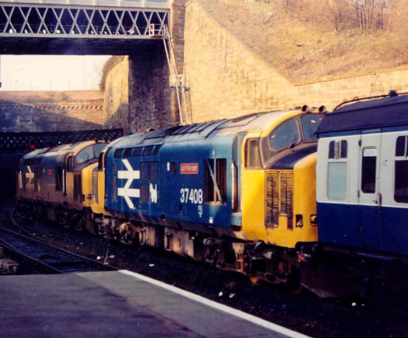Oban double header: To replace a failure at Oban 37407 LOCH LONG and 37408 LOCH RANNOCH double head the 1820 to Oban out of Queen Street in April 1988. Photo of Oban double header