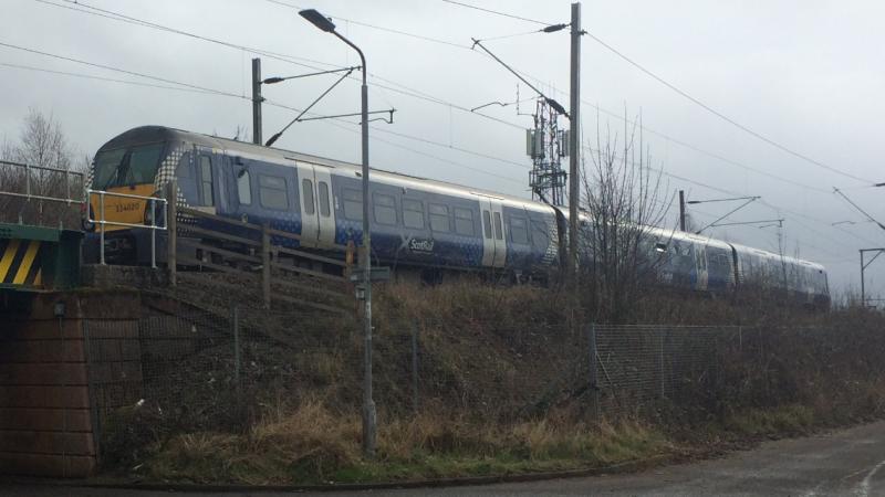 334020 passing Castlegreen Street: 334020 passes Castlegreen Street, east of Dumbarton, whilst working the 2V68 11:22 Dumbarton Central to Springburn on Wednesday 20th March 2019. Photo of 334020 passing Castlegreen Street