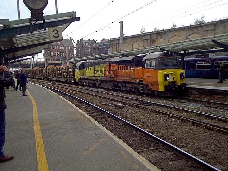 70807 at Carlisle: Colas 70807 passes though Carlisle with the timber working from Carlisle New Yard to Chirk on Tuesday 30th April 2019. Photo of 70807 at Carlisle