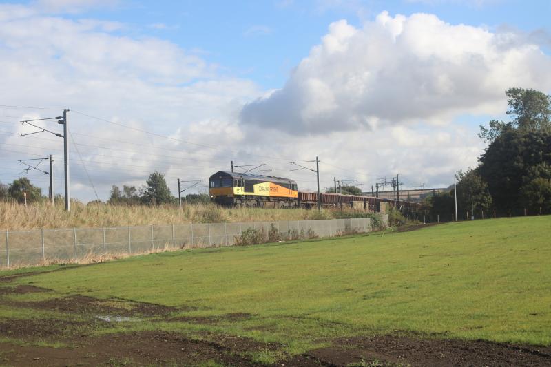 Colas at Monktonhall: 66 848 works 6S31 past Monktonhall junction on 27.9.21, with a fairly substantial load of 37 Coalfish carrying fresh ballast. Photo of Colas at Monktonhall